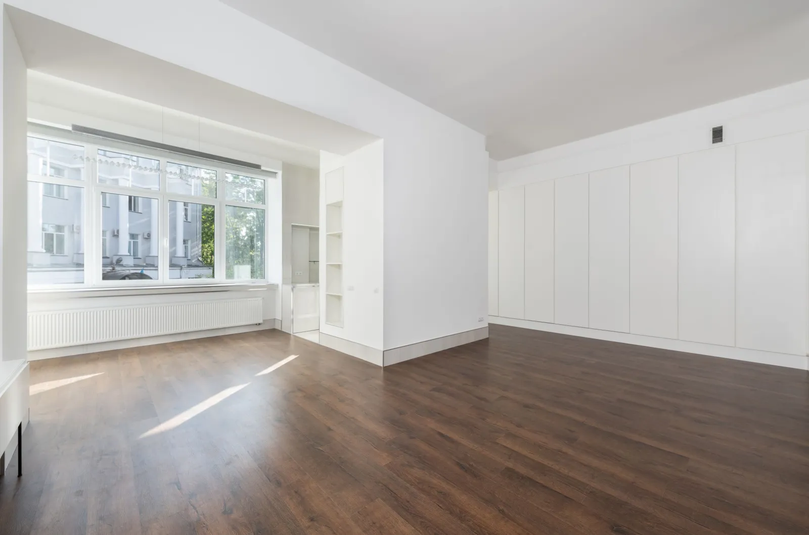 Vinyl plank flooring in a bright room with large windows — Davidsonville, MD area
